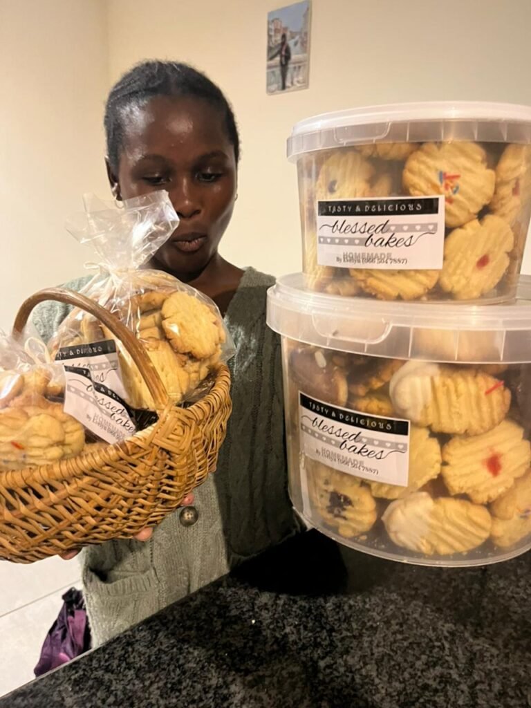 Tubs of homemade Blessed Bakes cookies